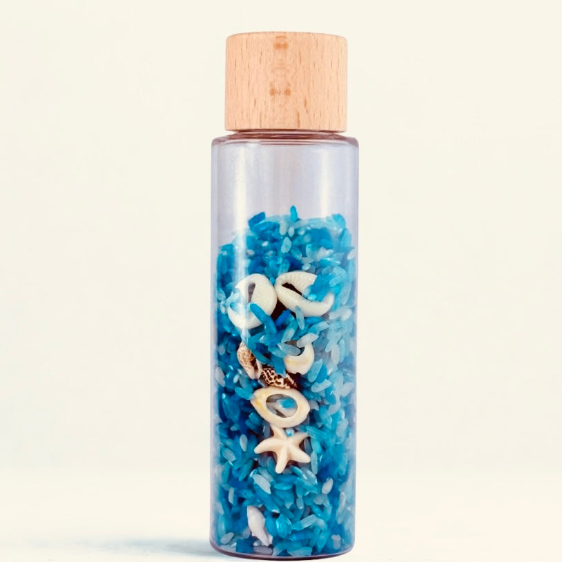 Bouteille sensorielle “trésor marin 🐚”